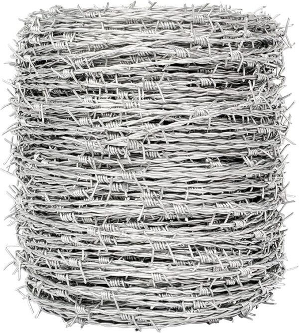 Galvanized barbed wire - Close-up full view of a large, tightly wound coil of bright silver galvanized barbed wire, emphasizing the product's quantity and metallic finish.